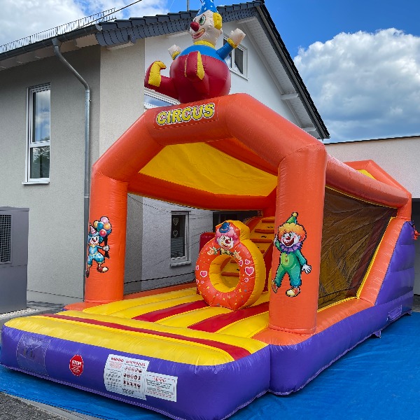 Hüpfburg Clown Center mit Super Slide Rutsche